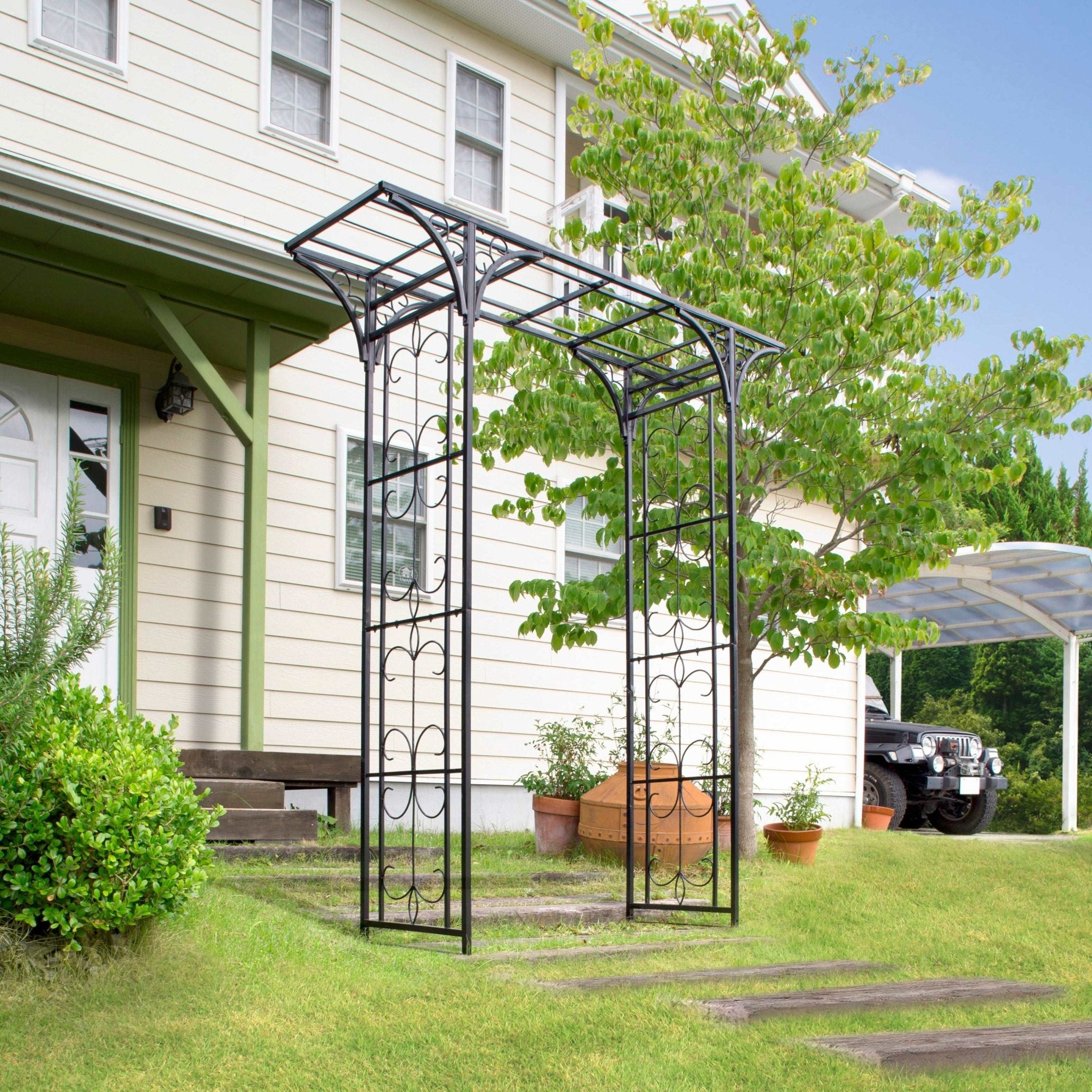 Image of the Osaka Garden Arch installed in a modern garden, showcasing its contemporary design and robust structure