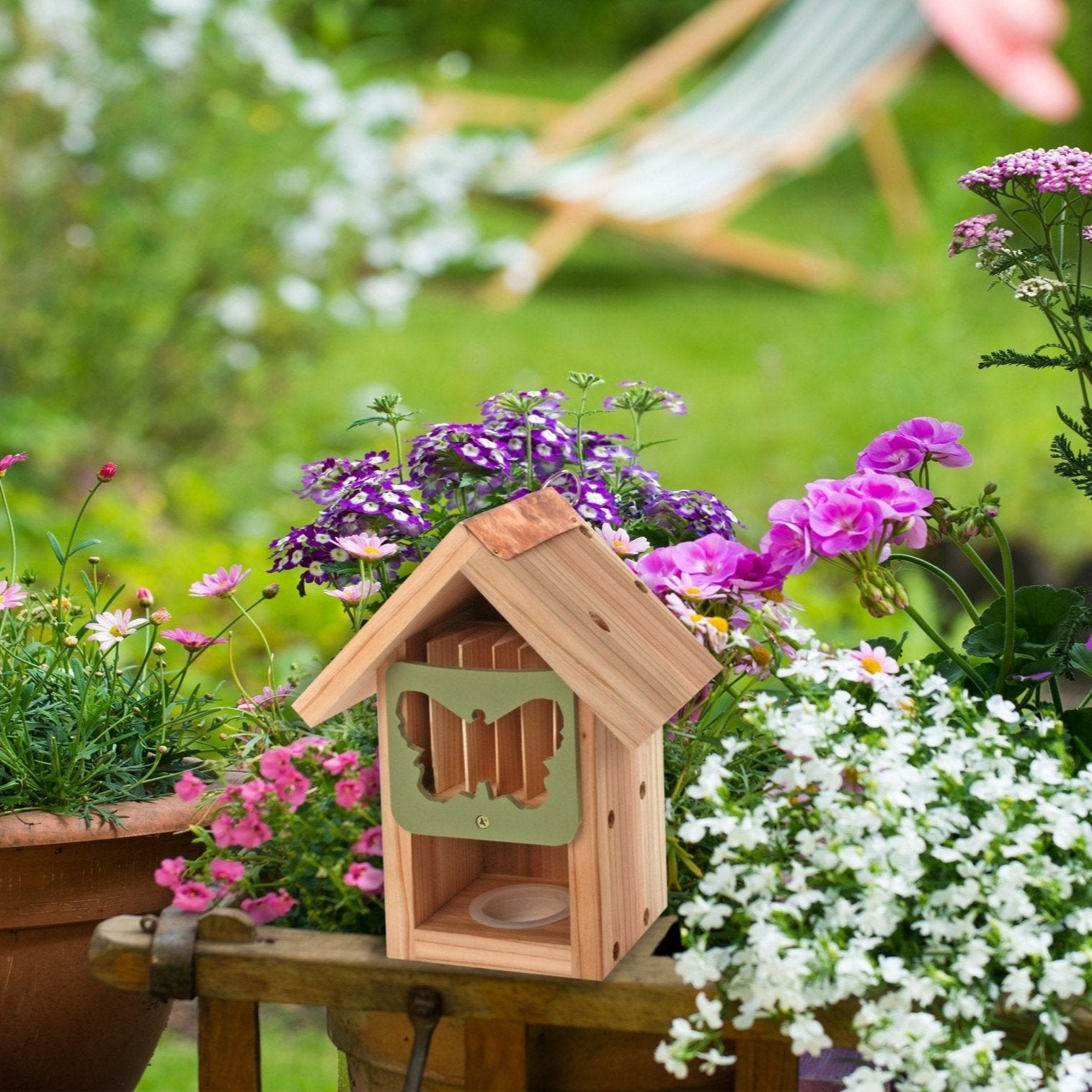 Butterfly Barn, wooden structure with butterfly-shaped entrance, attached to a tree trunk, copper roof detail, surrounded by natural greenery and flowers, butterfly resting on the entrance, eco-friendly pollinator shelter, ideal for gardens