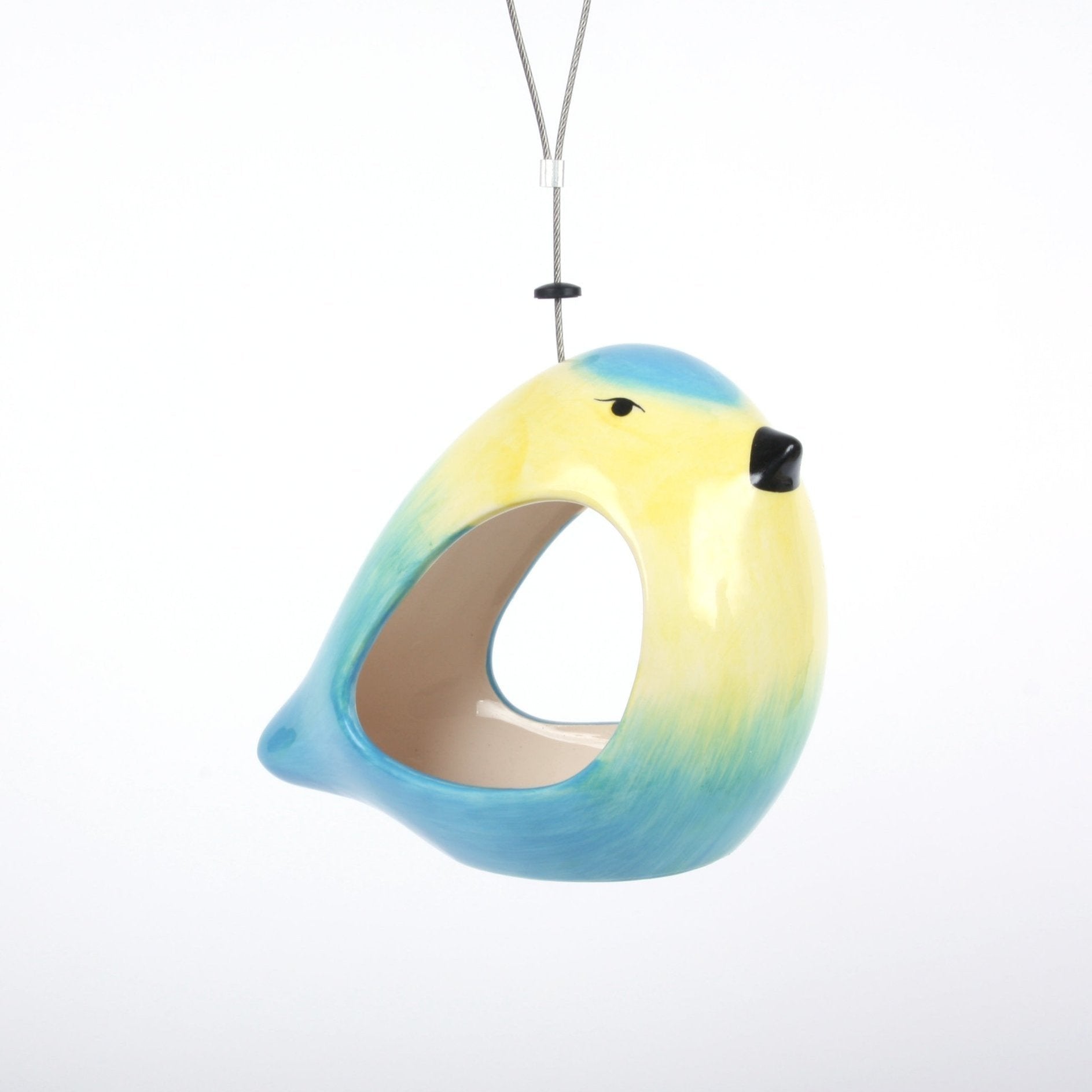 Ceramic Blue Tit Bird Feeder, bird-shaped design in vibrant blue and yellow colors, sleek ceramic finish, open entrance for easy bird access, suspended with a durable hanging wire, modern and stylish garden accessory