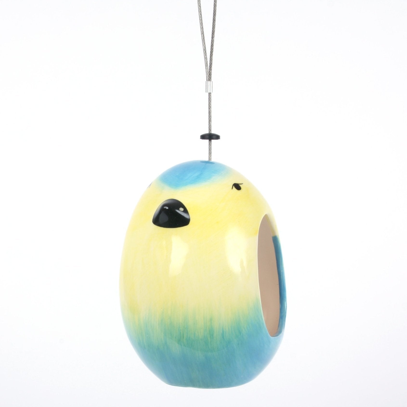 Ceramic Blue Tit Bird Feeder, bird-shaped design in vibrant blue and yellow colors, sleek ceramic finish, open entrance for easy bird access, suspended with a durable hanging wire, modern and stylish garden accessory