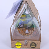 Dewdrop Window Bird Feeder - The Irish Gardener Store Packaged dewdrop-shaped window bird feeder, made of clear acrylic, displayed in eco-friendly cardboard packaging, featuring a label with a blue tit bird image and 'View Up Close' text, includes suction cups for window attachment, marked with award-winning badge and stick or hang option, birdseed visible in the design