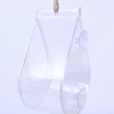 Dewdrop Window Bird Feeder - The Irish Gardener Store Transparent dewdrop-shaped window bird feeder, made of clear acrylic, featuring two suction cups for secure window attachment, lightweight and modern design, rope accent for optional hanging, empty open tray design, minimalistic bird feeder style