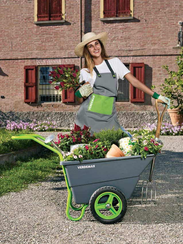 Image showcasing the Verdemax Multipurpose Wheelbarrow, featuring a unique one-handed design for effortless maneuverability and tiltable functionality for easy loading and unloading. The wheelbarrow is depicted outdoors, ready for use in various landscaping and gardening projects.