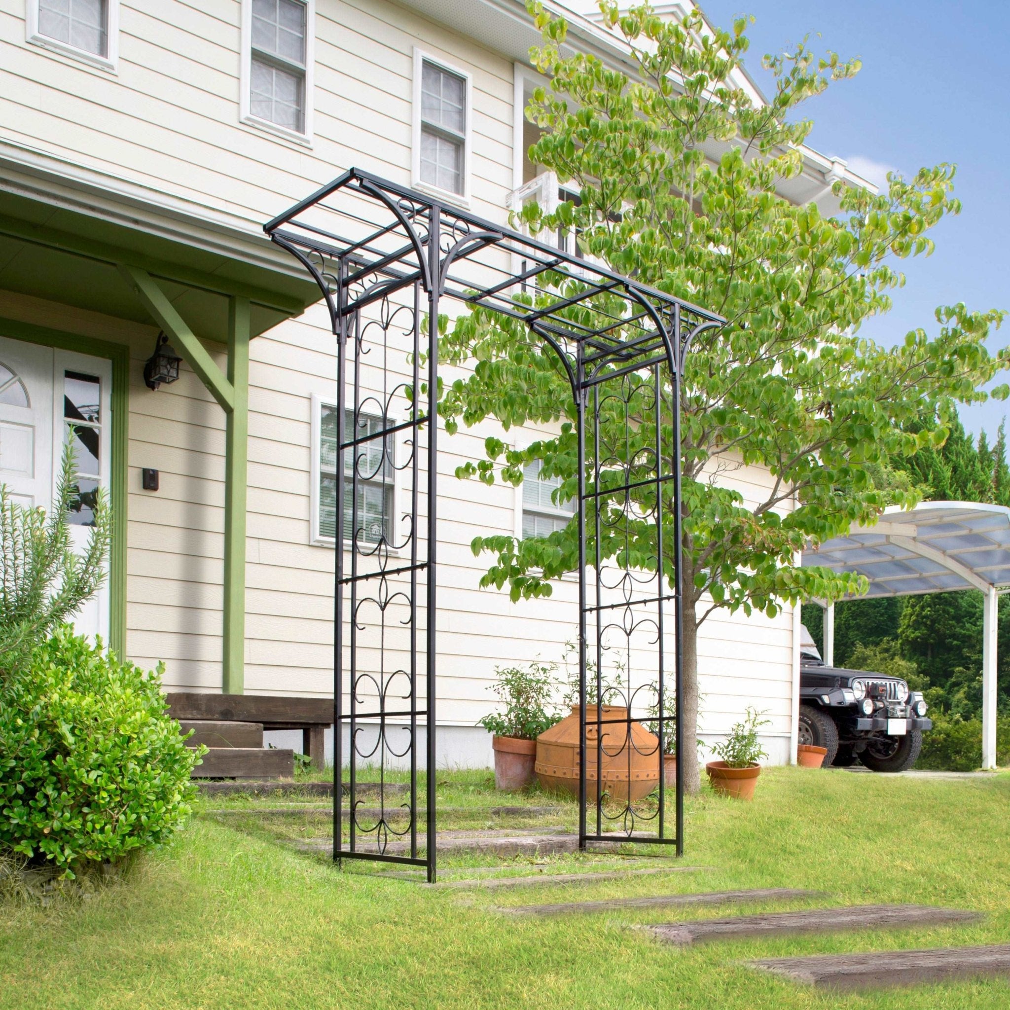 Image of the Osaka Garden Arch installed in a modern garden, showcasing its contemporary design and robust structure 