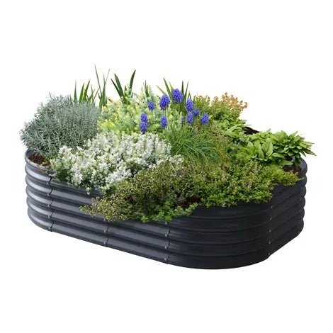 VegTub Modular Metal Raised Bed Kit in charcoal colour, filled with a variety of lush green herbs and vibrant flowering plants, designed for durable and stylish raised bed gardening.