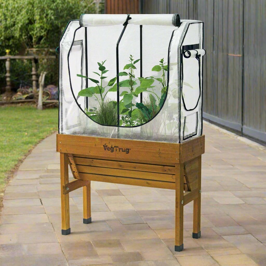 Image of the Wall Hugger Greenhouse Replacement Multi Cover installed on a greenhouse frame, available in small and medium sizes, showcasing its secure fit and durable design.