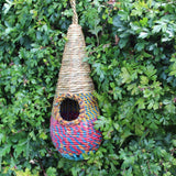 Tahera - Artisan Bird Nester - The Irish Gardener Store handcrafted Tahera Artisan Bird Nester, eco-friendly woven bird house, vibrant natural fiber bird nester, sustainable bird shelter with colorful design, cone-shaped hanging bird nester, rustic garden birdhouse, artisan-crafted nesting habitat