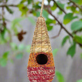Tahera - Artisan Bird Nester - The Irish Gardener Store handcrafted Tahera Artisan Bird Nester, eco-friendly woven bird house, vibrant natural fiber bird nester, sustainable bird shelter with colorful design, cone-shaped hanging bird nester, rustic garden birdhouse, artisan-crafted nesting habitat